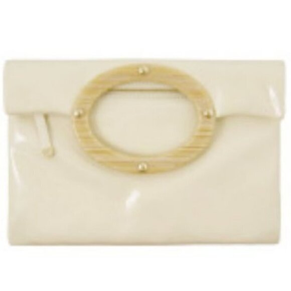 kate spade Handbags - Kate Spade Ivory Patent Leather Jocelyn Clutch